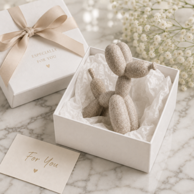 Sandstone balloon dog statue in white gift box with tissue paper and gift card