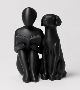 Abstract reading person dog statue in matte black — minimalist book lover dog gift