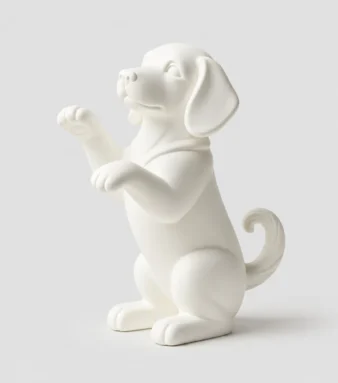 White raised paw puppy figurine in begging pose — minimalist dog lover ornament