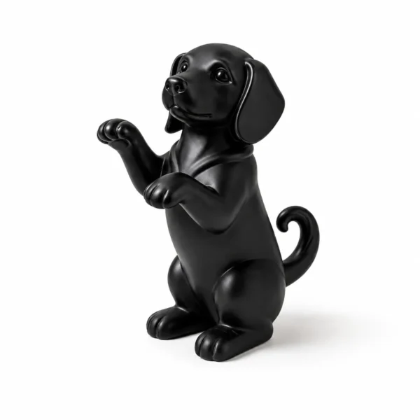 Black raised paw puppy figurine in begging pose — cute dog lover desk ornament